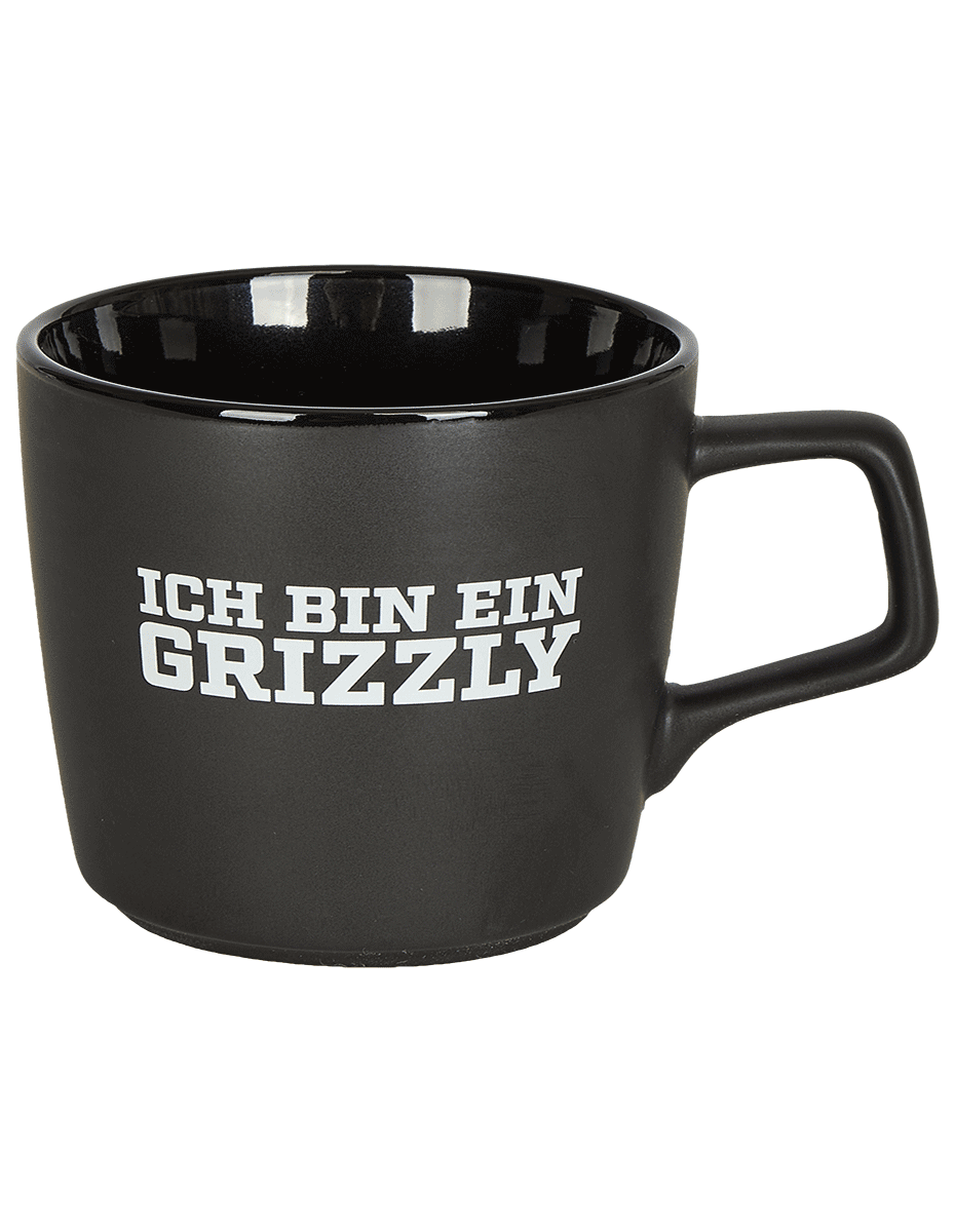 Das Foto zeigt eine schwarze Keramiktasse der Grizzlys Wolfsburg mit eingebranntem Logo.
