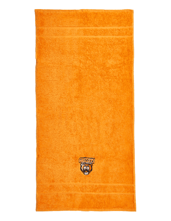 Das Foto zeigt ein Handtuch der Grizzlys Wolfsburg in orange mit aufgesticktem Logo.